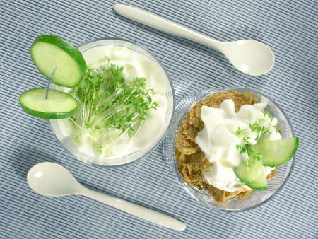 greek yogurt  with cucumber and watercressの写真素材