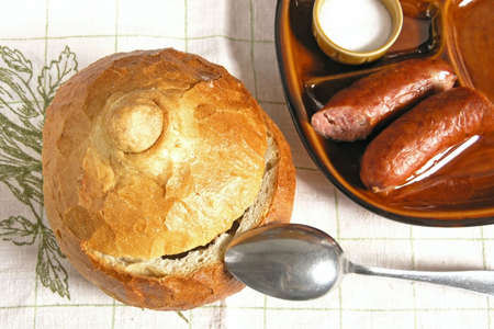 hot soup in fresh bread tureenの写真素材