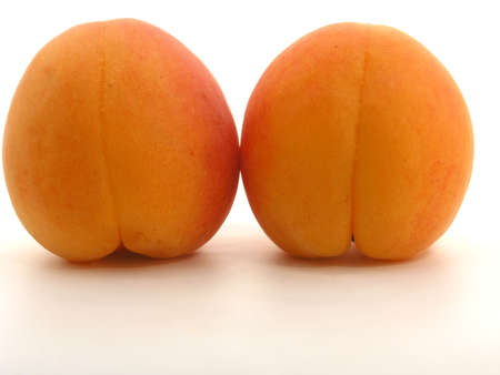 apricots isolated on white backgroundの写真素材