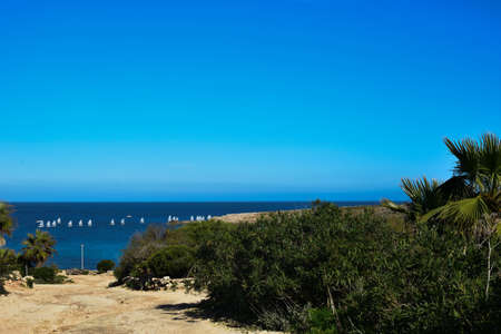 View from the island of Comino on sailboatsの写真素材