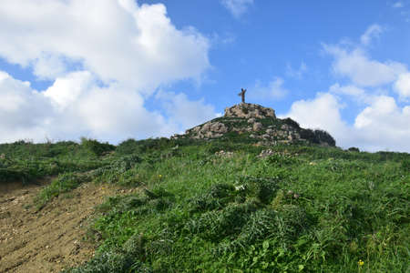 Gozo the statue of Christ on the hillの写真素材