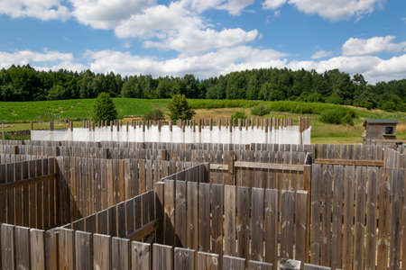 Wooden and foggy maze in Kashubian amusement parkの写真素材