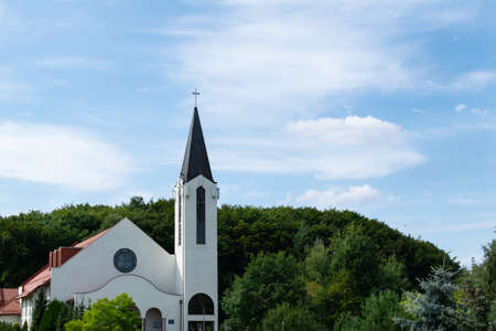 Church tower against the sky. Gdynia, Pomeraniaの写真素材