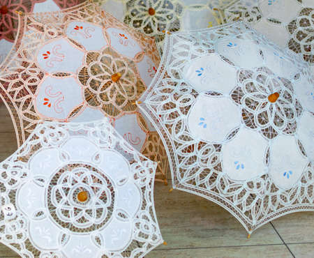 Colorful umbrellas on display at a store. Paphos, Cyprus. Openwork sunshade from the sun.の写真素材