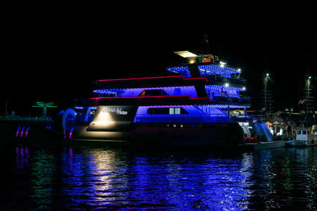Cruise ship in the port by night. Ship night lighting. Ship with a water slide. Paphos, Cyprus.の写真素材