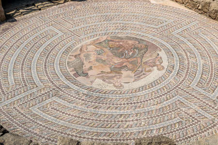 Ancient stone mosaics. Archaeological Park, Paphos, Cyprus. Mythological scenes on the floors.の写真素材