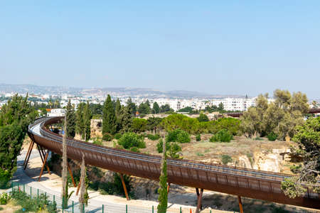 Metal pedestrian bridge. Paphos, Cyprus. The footbridge leads to the ruins of the city.の写真素材