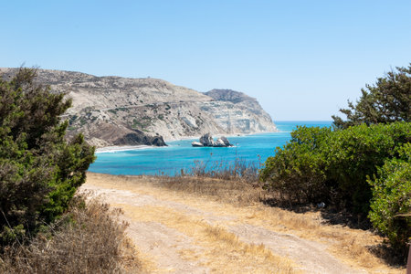 Mediterranean landscape. Sea and mountains. Rocks emerging from the sea. Cyprus, near Kuklia.の写真素材