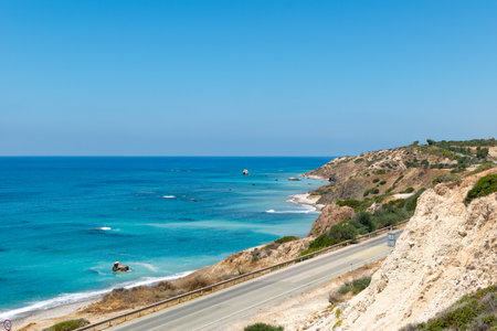 Cyprus coast landscape. The road along the sea by the rock of Aphrodite. Azure water.の写真素材
