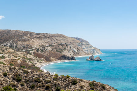 Mediterranean landscape. Sea and mountains. Rocks emerging from the sea. Cyprus, near Kuklia.の写真素材