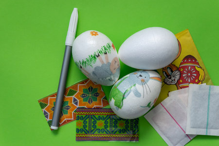 Easter eggs. Getting ready to paint Easter eggs. Colored paints and felt-tip pens.の写真素材