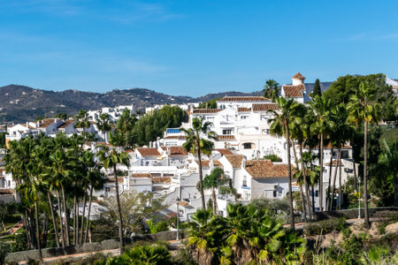 White houses in the city of Nerja, Andalusia, Spain. View of the city and mountains.の写真素材