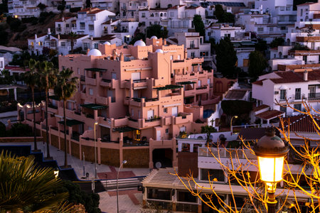 View of the city of Nerja, Andalusia, Spain. Sunrise over the seaside town.の写真素材