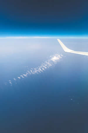 view from the airplane window, cloud wing, dimensionsの写真素材