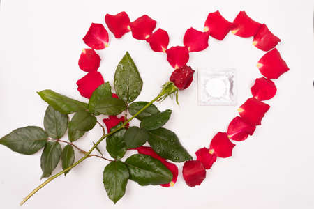 Dear love roses special occasions along with condoms isolated backgroundの写真素材