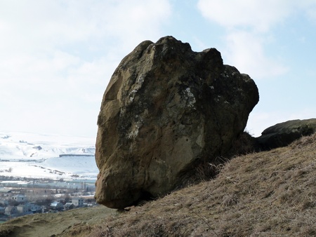 Huge stone on clay cavesの写真素材