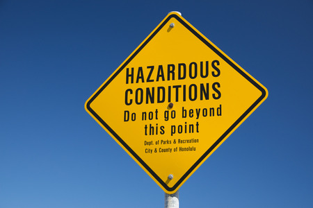 hazardous conditions danger sign in hawaii on the shore