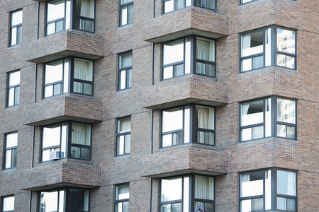American building windows detail in the sunny dayの写真素材