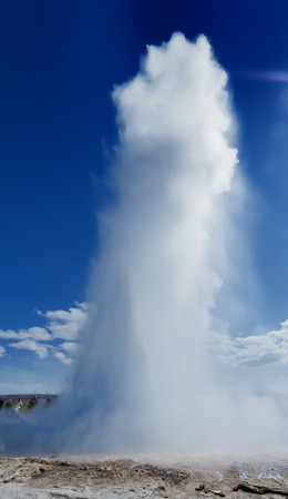 Geyser blow in Iceland while blowing water の写真素材