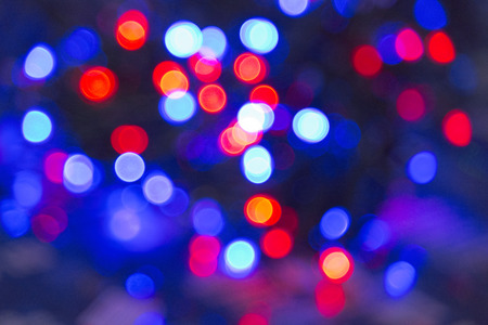 blur lights christmas background on blackの写真素材