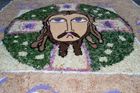 infiorata corpus christ religious celebration flower street in italian villageの写真素材