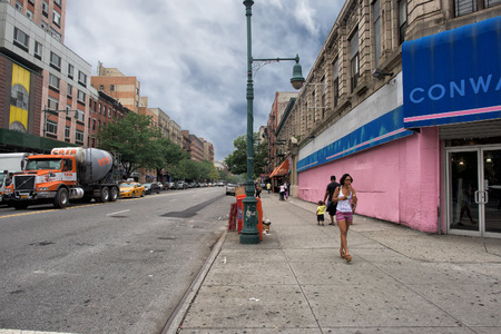 NEW YORK, USA - JUNE 15, 2015 - American people walking in Harlem on weekdayのeditorial素材