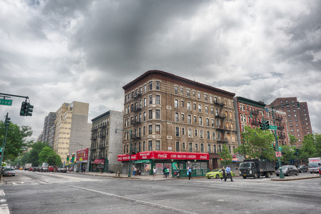 NEW YORK, USA - JUNE 15, 2015 - American people walking in Harlem on weekdayのeditorial素材