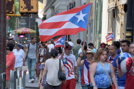 NEW YORK CITY - JUNE 14 2015: Annual Puerto Rico Day Parade filled 5th Avenue with some 80,000 marchers & more than one million spectatorsのeditorial素材