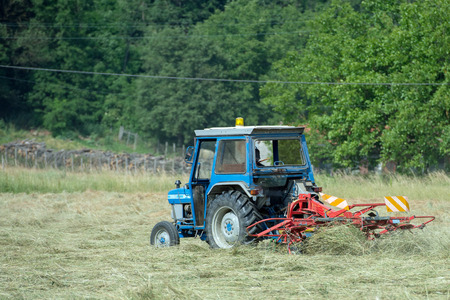 Tractor on green grass field
