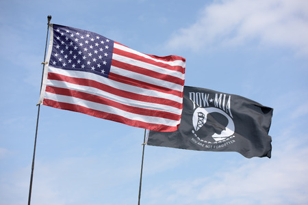 American flag along with the POW MIA flag
