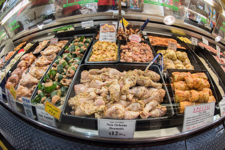 ADELAIDE, AUSTRALIA - SEPTEMBER 1, 2015 - People buying at town fresh marketのeditorial素材