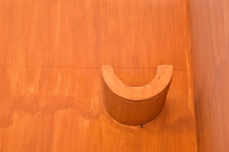 mexican house roof and wall detail on blue sky backgroundの写真素材