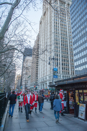 NEW YORK, USA - DECEMBER 10, 2011 - Town people deressed as santa claus celebrating christmas in manhattan streetsのeditorial素材