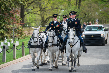 WASHINGTON D.C., USA - MAY, 2 2014 - US Army marine funeral at Arlington cemetery: coffin on the horse coachのeditorial素材