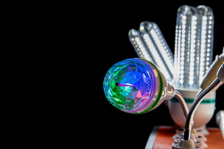 hypnotic neon lamp on the black backgroundの写真素材