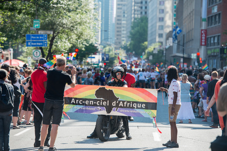 MONTREAL, CANADA - AUGUST, 18 2013 - Gay Pride parade on town streetのeditorial素材