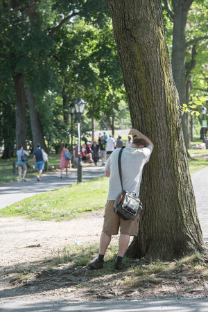 NEW YORK - USA - 14 JUNE 2015 people is spending time amusing in central park on sunny sundayのeditorial素材