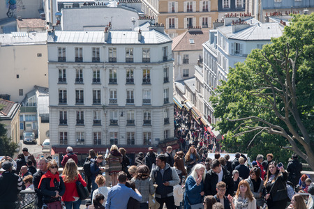 PARIS, FRANCE - MAY 1 2016 - Montmartre stair is crowded of french people toruists on sunday sunny day of labour international celebrationのeditorial素材
