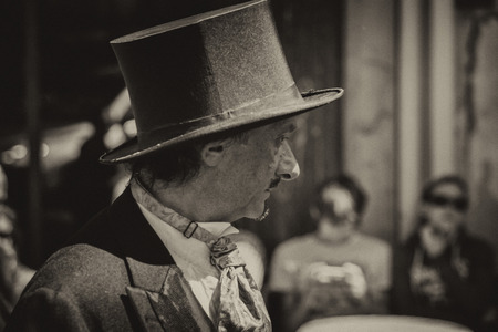 PARIS, FRANCE - MAY 1 2016 - Montmartre is crowded of french people toruists on sunday sunny day of labour international celebration. Old dressed man is on the streetのeditorial素材