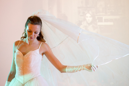 MILAN, ITALY - MARCH 22, 2013 - Photoshow  international photo exhibition where you can test photo gear and take free photo of modelsのeditorial素材