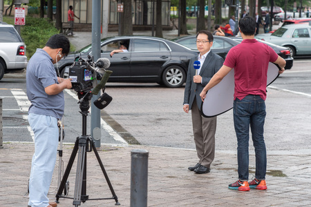 WASHINGTON D.C., USA - JUNE, 21 2016 - KBS is broadcasting television  news live at White House buildingのeditorial素材