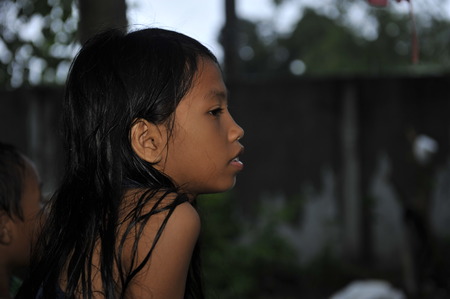 CEBU - PHILIPPINES - JANUARY,1 2013 - Annual orphan children party they receive food and giftsのeditorial素材