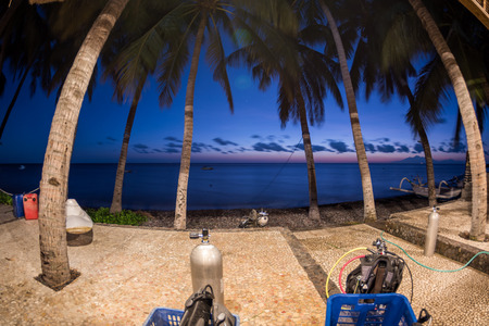 tank and scuba gear ready at sunrise before diving indonesiaの写真素材