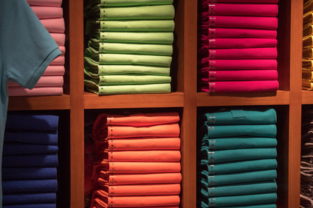 different colors polo shirt on display standの写真素材