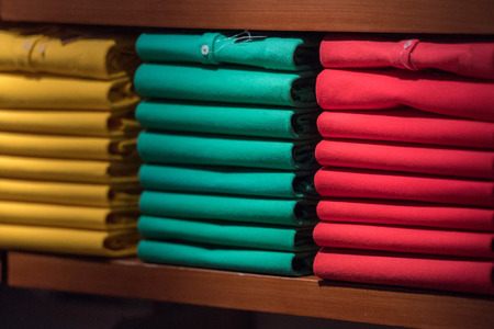 different colors polo shirt on display standの写真素材