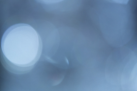 blur lights christmas background on blackの写真素材