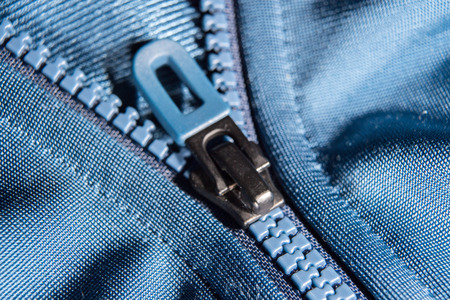 zip close up macro on clothes background