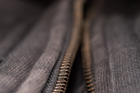 zip close up macro on clothes backgroundの写真素材