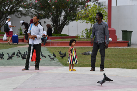 MALE, MALDIVES - MARCH, 4 2017 - People i in island main place before evening pray time in male maldives capital small island townのeditorial素材