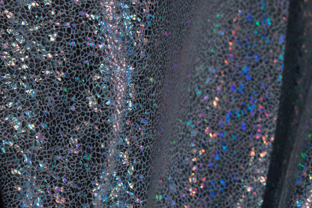 Glitter dress background shiny texture close up detailの写真素材